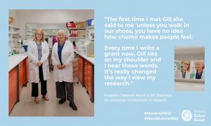 two women in lab coats smiling in the Marsh Lab at UNSW